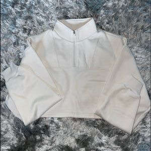 EVOLUTION HALF ZIP SWEATER
IVORY